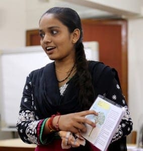 Junior financial counselor going through financial education curriculum (India)