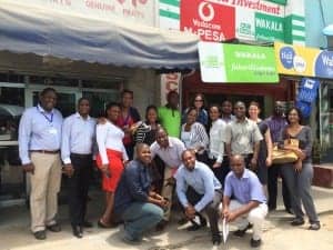 Photo of training group outside an agent's store