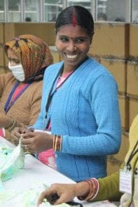 India Women Factory Workers Smiling In Blue 200x300 1