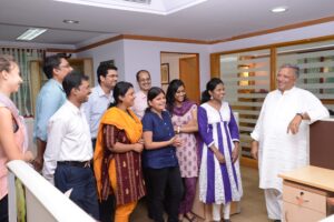 Staff with Ujjivan CEO Samit Ghosh at their headquarters in Bangalore, India