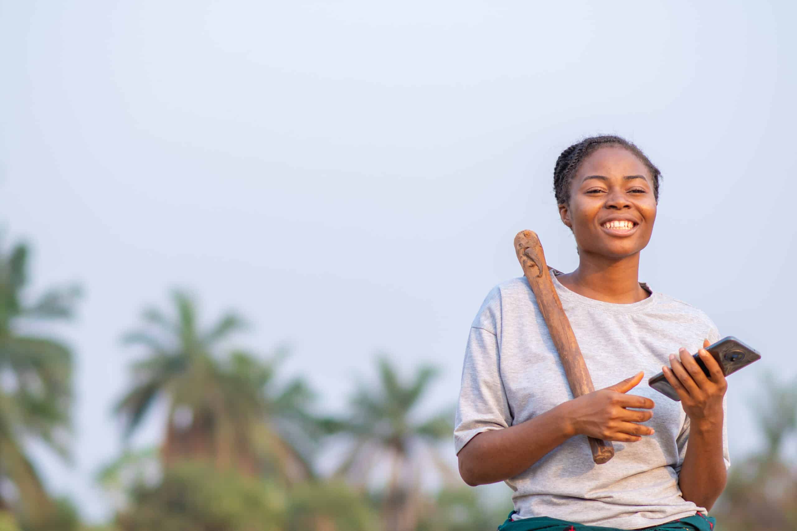 A woman entrepreneur using digital financial services, showing the use case for financial inclusion