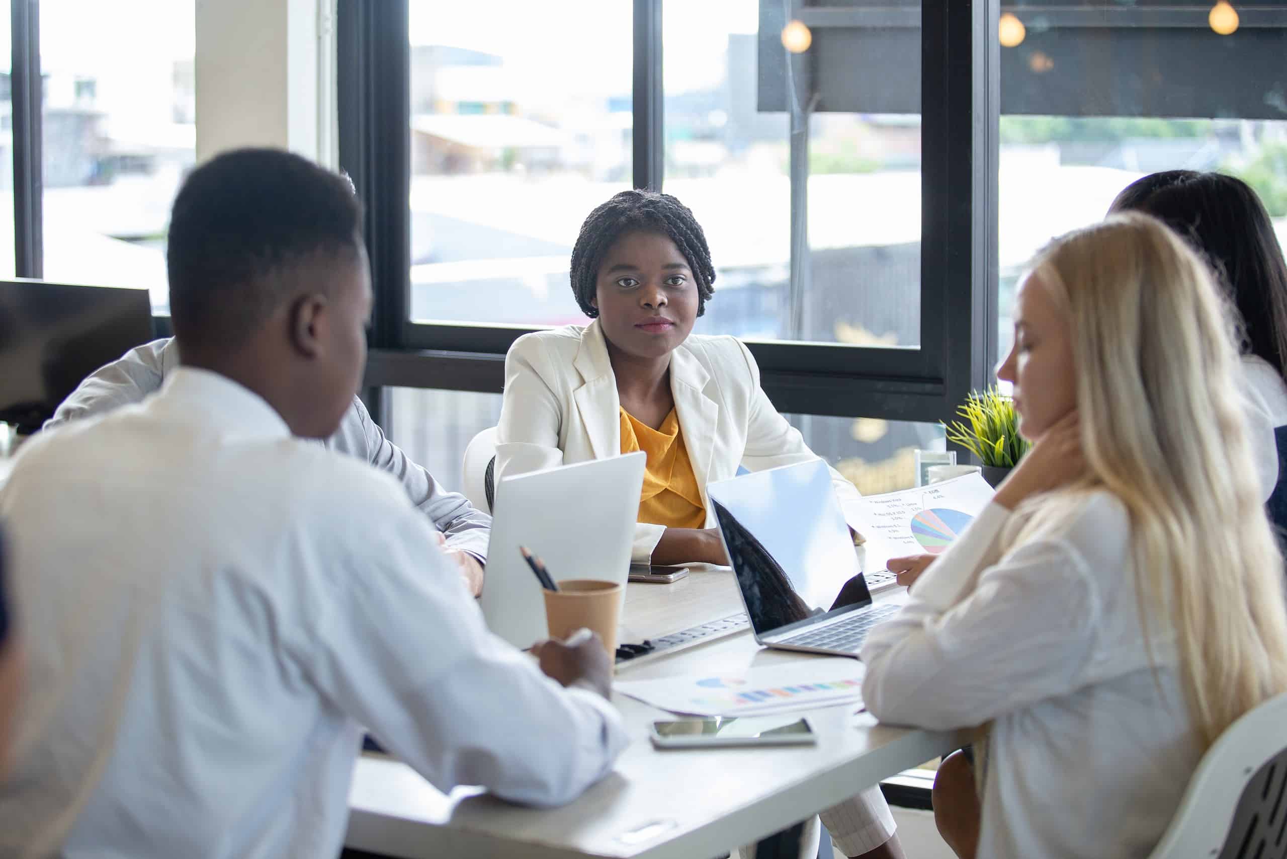 Women in Leadership: A diverse group of colleagues in an office